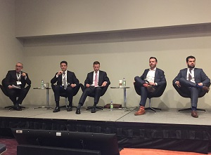 From left to right in the photo, moderator and panelists Richard Diamond, Casey Gallagher, Bryce Gibson, Steve Keyzer and Mehdi Shokri discuss land sales and market conditions at the Toronto conference.